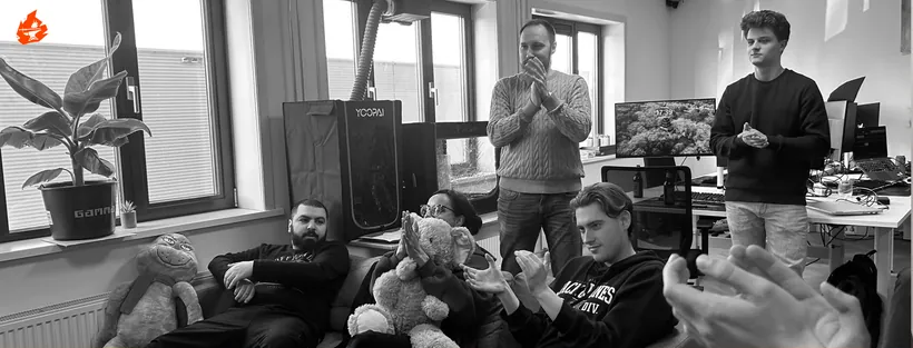 The team gathered on the couches in the studio